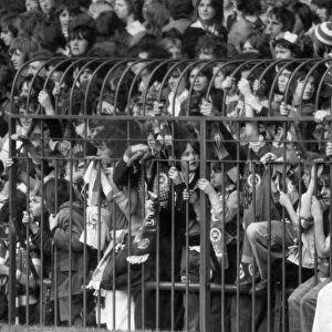 A section of the caged fans at the Stretford End of Old Trafford watching the match