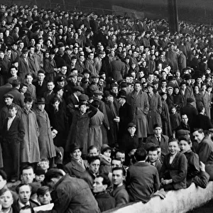 A section of the crowd on the Spion Kop at Anfield waiting for the sale of tickets for