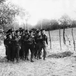 A section of the Maquis, a rural guerrilla band of French Resistance fighters during