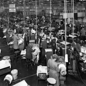 A section of the Transformer coil winding shop at the English Electric Company A section of the Transformer coil winding shop at the English Electric Company