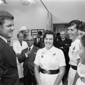 Senator Edward Kennedy seen here speaking to Sister Maureen Rouse (centre