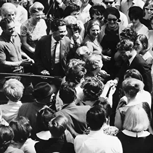 Senator Robert Kennedy surrounded by well wishers in London