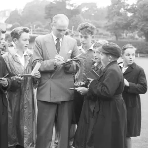 September 1957 Northants and England batsman Dennis Brooks surrounded by autograph September 1957 Northants and England batsman Dennis Brooks surrounded by autograph
