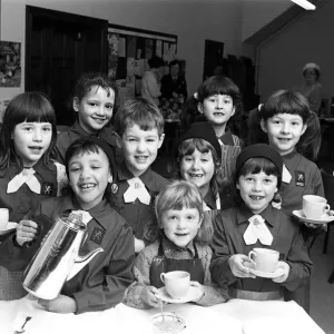 Service with a smile... pouring out the coffees are these Slaithwaite Brownies who raised