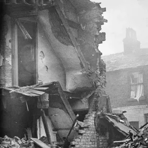 These two sets of stairs in a Liverpool house hit by a Nazi night bomb in a recent raid These two sets of stairs in a Liverpool house hit by a Nazi night bomb in a recent raid
