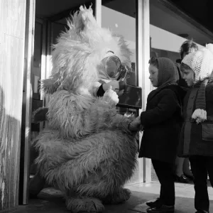 Seven foot cat on Stockton Hight Street. 1971