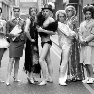 Seven men impersonators are appearing at a West End Night Club where they do Seven men impersonators are appearing at a West End Night Club where they do