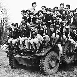 Sixty seven Scouts and cubs clambered onto an army scout car when it called at their camp