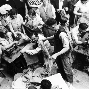 Sewing sand bags in the East End of London during WW2 1939 Sewing sand bags in the East End of London during WW2 1939