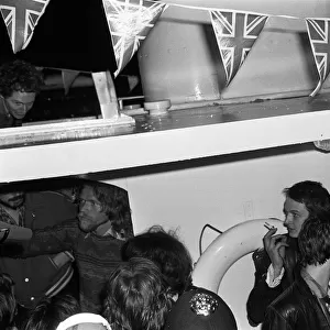 Sex Pistols Jubilee boat party on the Thames. Pictured, guests after the police forced
