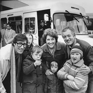 The Shadowss Hank Marvin at the bus handover with (l-r) Neal Armstrong, 13