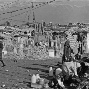 Shanty town on the eastern edge of Tehran, where open sewers run past houses made of mud Shanty town on the eastern edge of Tehran, where open sewers run past houses made of mud
