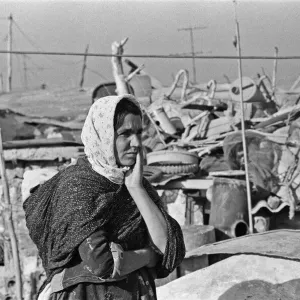 Shanty town on the eastern edge of Tehran, where open sewers run past houses made of mud Shanty town on the eastern edge of Tehran, where open sewers run past houses made of mud