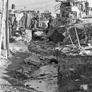 Shanty town on the eastern edge of Tehran, where open sewers run past houses made of mud Shanty town on the eastern edge of Tehran, where open sewers run past houses made of mud