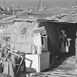 Shanty town on the eastern edge of Tehran, where open sewers run past houses made of mud Shanty town on the eastern edge of Tehran, where open sewers run past houses made of mud