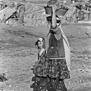 Shanty town on the eastern edge of Tehran, where open sewers run past houses made of mud Shanty town on the eastern edge of Tehran, where open sewers run past houses made of mud