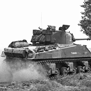 A Sherman VC Firefly tank of 24th Lancers, 8th Armoured Brigade, near St Leger