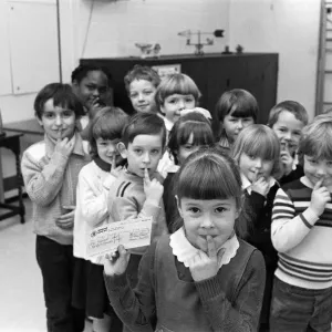 Shhh... says five-year-old Emily Fozzard as she hands over this &pound