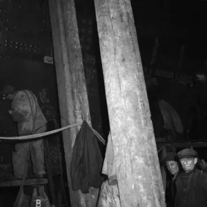 Shipbuilders at the King George V dry dock in Southampton replace damaged hull plates of Shipbuilders at the King George V dry dock in Southampton replace damaged hull plates of