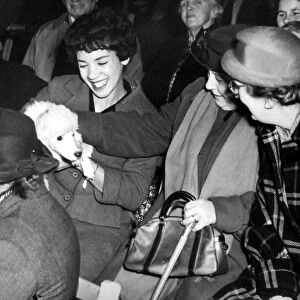 Shirley Bassey, the Cardiff born singer, pictured with her poodle during a concert held