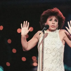 Shirley Bassey performing at the Cor World Choir concert at Cardiff Arms Park Shirley Bassey performing at the Cor World Choir concert at Cardiff Arms Park