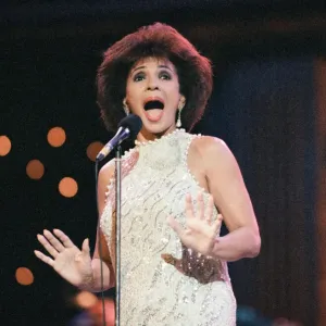 Shirley Bassey performing at the Cor World Choir concert at Cardiff Arms Park Shirley Bassey performing at the Cor World Choir concert at Cardiff Arms Park