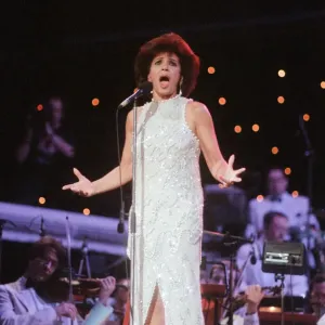 Shirley Bassey performing at the Cor World Choir concert at Cardiff Arms Park Shirley Bassey performing at the Cor World Choir concert at Cardiff Arms Park