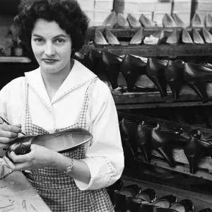 Shoes being finished and trimmed at the H Solomons factory, Print 1956