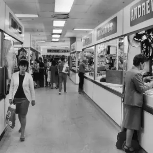 Shoppers browsing in Manchesters High Street Market. 10th July 1985 Shoppers browsing in Manchesters High Street Market. 10th July 1985