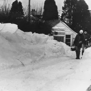 Shoppers head home after buying essential supplies and groceries are pictured leaving Shoppers head home after buying essential supplies and groceries are pictured leaving