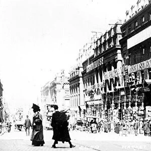 Shoppers throng Market Street in 1912 complete with gas lamps