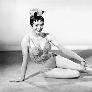 Showgirl posing in the Reveille Studio. 1962 E152-001