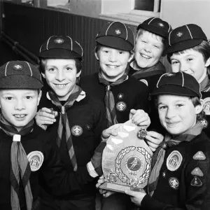 Showing off the shield they won in a five-a-side football competition are these members Showing off the shield they won in a five-a-side football competition are these members