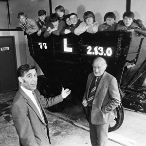 Showing off their work - YTS youngsters and Tanfield Railway official Derek Charlton with