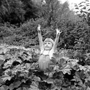 Siblings, Helen (3) and Paul Burrows (9) from Waterloo, London