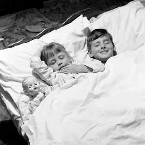 Siblings, Helen (3) and Paul Burrows (9) from Waterloo, London