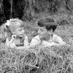 Siblings, Helen (3) and Paul Burrows (9) from Waterloo, London