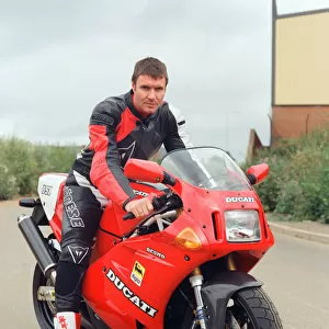 Simon Le Bon from Duran Duran on a Ducati Motobike. It is not clear if this is