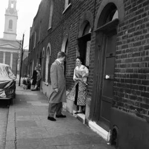Black and white print of Tommy Steele outside his Bermondsey home