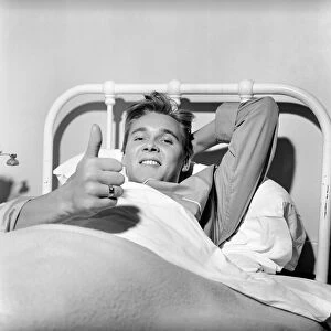 Singer Billy Fury in bed at a Cambridge Nursing Home, following his collapse in a taxi in