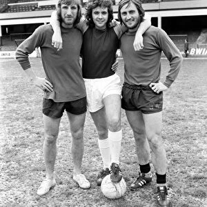 Singer David Essex pictured at Upton Park with footballers Billy Bonds