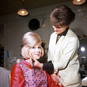 Singer Dusty Springfield being made up by Hilary Bates for "
