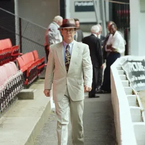 Singer Elton John is back at Watford promising to do what he can to lift the Second