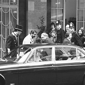Singer Frank Sinatra seen here leaving Claridges Hotel amid high security