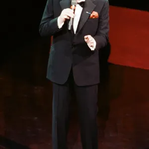 Singer Frank Sinatra seen here performing on stage at the Royal Albert Hall