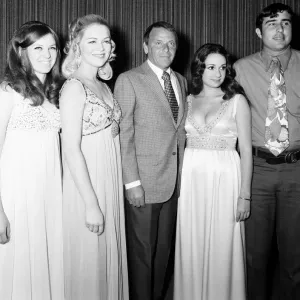 Singer Frank Sinatra seen here with some of the winners during the annual Frank Sinatra