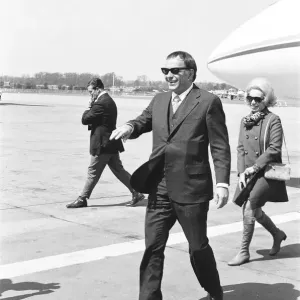 Singer Frank Sinatra who is in the United Kingdom to perform two charity concerts in aid