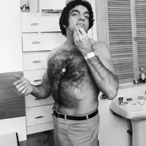 Singer Frankie Vaughan poses in his bathroom at home. December 1970 Singer Frankie Vaughan poses in his bathroom at home. December 1970