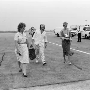 Print of Phil Collins and wife at London Heathrow Airport