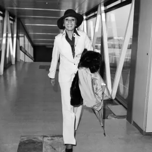 Singer Shirley Bassey arrives at London Airport from Switzerland